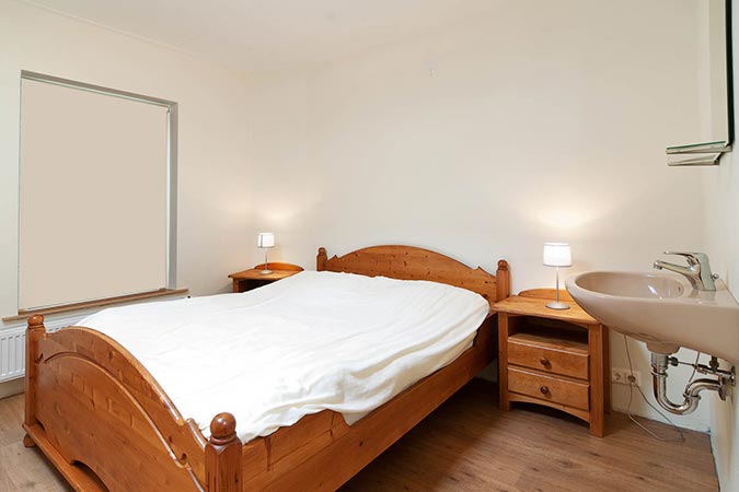 Slaapkamer 1 Groepsaccommodatie Weidezicht